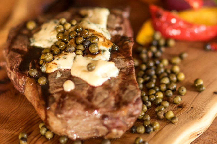 peppercorn steak with blue cheese and balsamic reduction